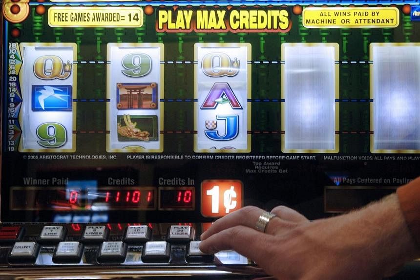A Vienna gambler will get back almost 440,000 euros (S$718,351) that he squandered on slot machines, after a local court ruled that he suffered from an addiction, his lawyer said Thursday. -- PHOTO: BLOOMBERG