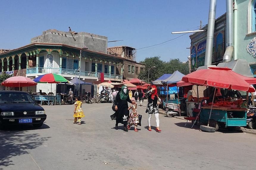 The capital of China's far western Xinjiang has banned the wearing of Islamic veils in public, the regional government said on Dec 11, 2014, in a move experts worry could spark more unrest in the troubled region. -- PHOTO: ST FILE