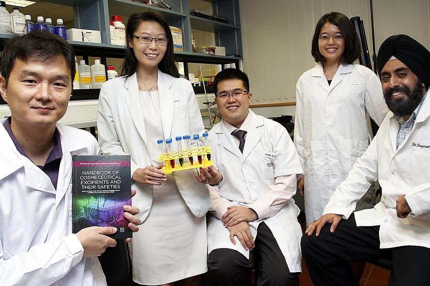 The researchers, comprising (from left) Dr Kang Lifeng, Dr Poh Ai-Ling, Mr Kwan Yu Heng, Ms Tung Yee Kei and Dr Jaspreet Singh Kochhar, studied the labels of 257 skincare products commonly sold at retail pharmacies here. They want to conduct further 