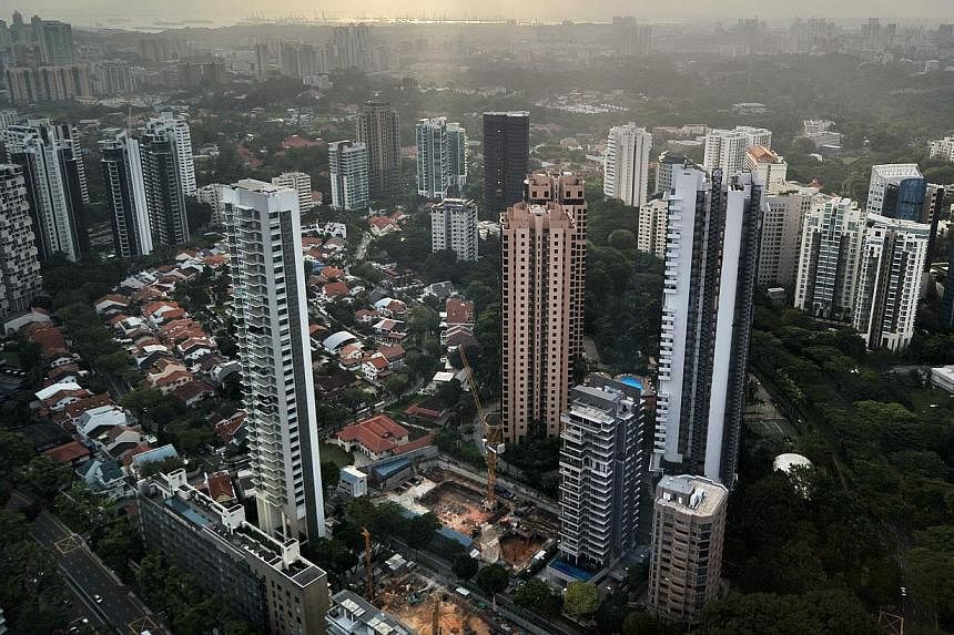 High-rise condominium buildings in the Singapore city centre and outskirts. One in four private home owners will pay less property tax next year after the taxman marked down the annual values of about 73,300 homes. -- ST PHOTO: ALPHONSUS CHERN