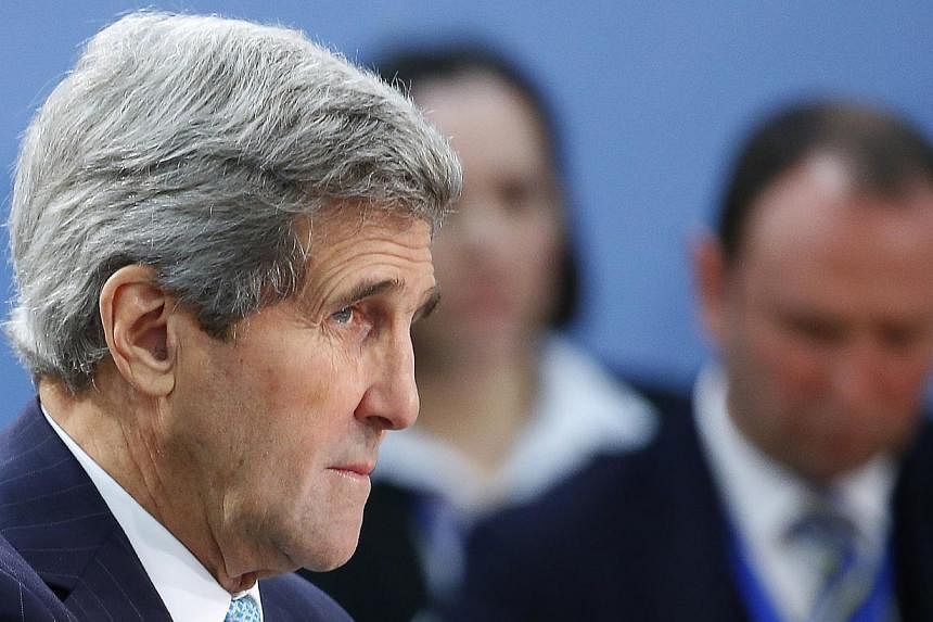 US Secretary of State John Kerry (above left) will head to Rome on Sunday for a surprise meeting with Israeli Prime Minister Benjamin Netanyahu, his spokeswoman said. -- PHOTO: REUTERS