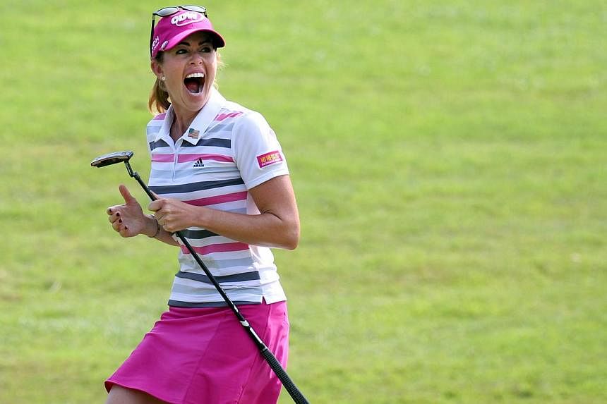 American golfer Paula Creamer celebrates after sinking an eagle to win the HSBC Women's Champions at Sentosa Golf Club on March 2, 2014. -- PHOTO: ST FILE