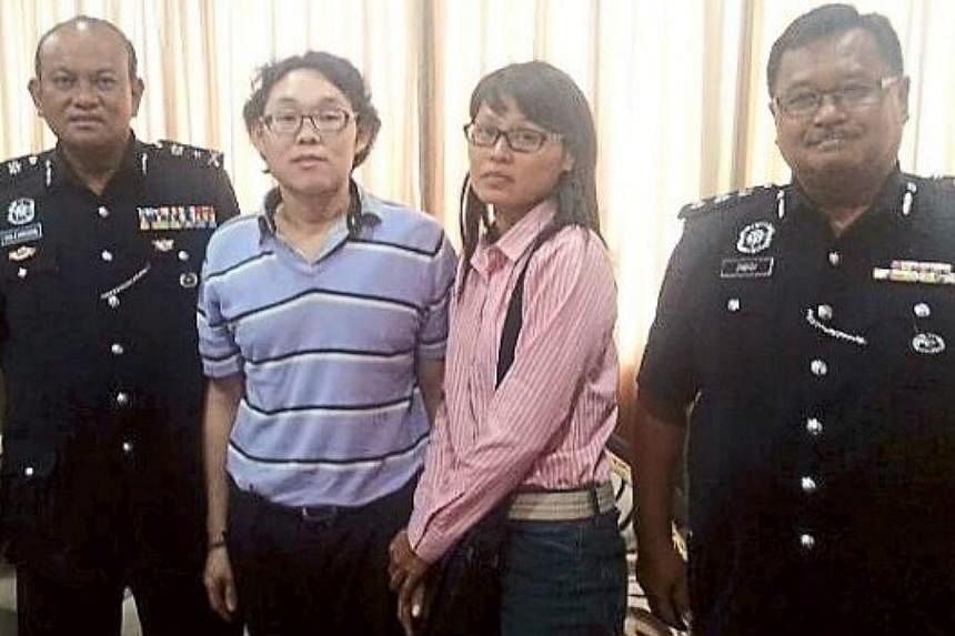 (From left) Sabah CID chief SAC Salehudin Abdul Rahman, former hostage Chan Sai Chuin, his wife Chin Pek Nyen and Sandakan police chief ACP Zabidi Zain. -- PHOTO: THE STAR/ASIA NEWS NETWORK