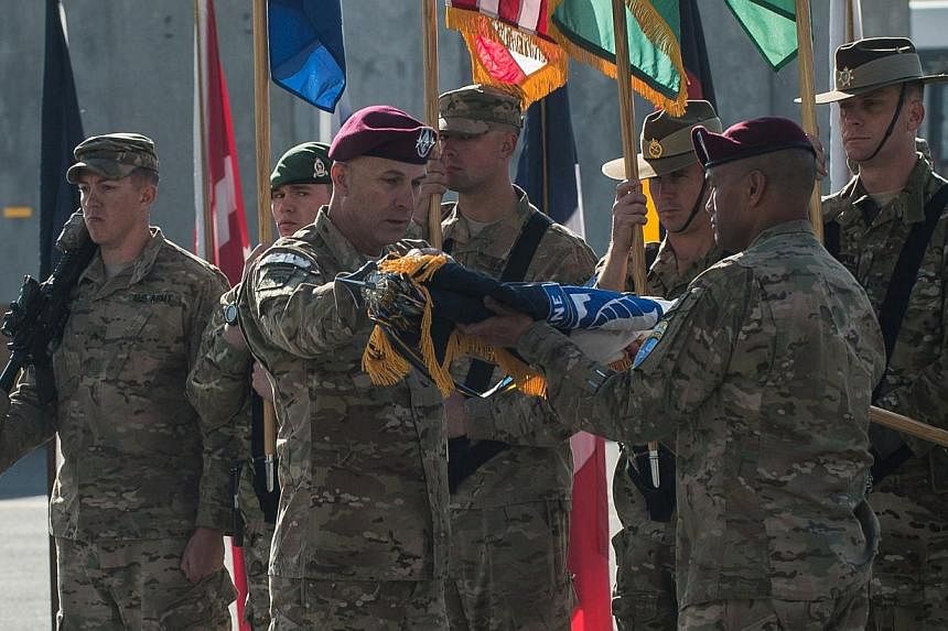 Lieutenant-General Joseph Anderson (second from left),&nbsp;who brought the Nato coalition's combat operations in Afghanistan to an end this week after over 13 years of war, said Afghan security forces were "inept" at basic motor maintenance and were