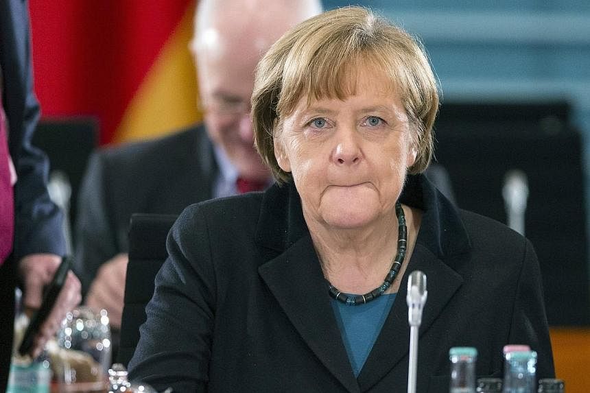 German Chancellor Angela Merkel meets German state leaders at the chancellery in Berlin on Dec 11, 2014. -- PHOTO: REUTERS