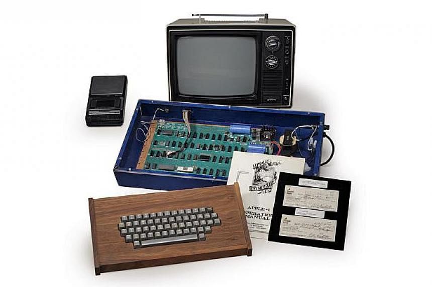 A fully operational Apple computer that company co-founder Steve Jobs sold out of his parents' garage in 1976 for US$600 is seen in this undated handout picture courtesy of Christie's. The so-called Ricketts Apple-1 Personal Computer, named after its