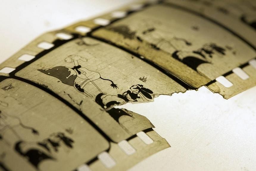 A handout photo released on Dec 11, 2014 by the National Library of Norway shows a restored copy of the animated short film dated 1927 Empty Socks from Walt Disney Christmas series Oswald the Lucky Rabbit. The film presumed lost has been found in the