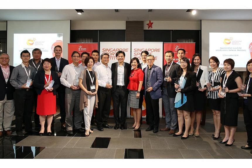Minister Lawrence Wong with representatives from each of the 20 corporate partners in the spexBusiness Network for Athletes. Sport Singapore has unveiled seven more partnering corporations in its Sports Excellence Business (spexBusiness) Network for 