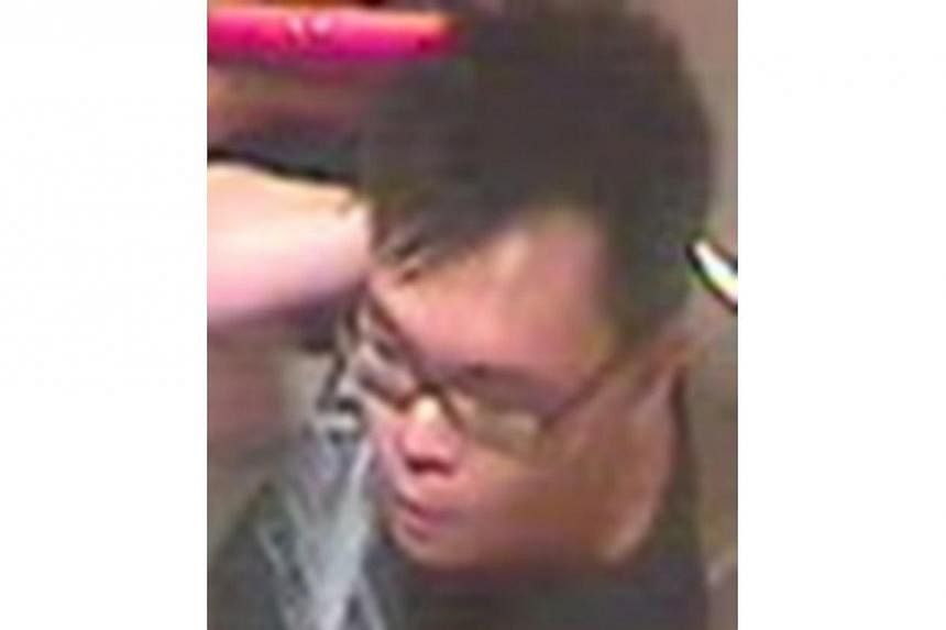 The man in question is believed to be of medium build with short black hair, as pictured.-- PHOTO: SINGAPORE POLICE FORCE