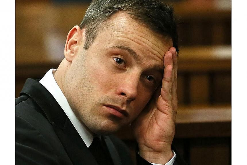 A file picture taken on Oct 16, 2014 shows Paralympian Oscar Pistorius reacting during his sentencing hearing at murder trial at the Pretoria high court. Oscar Pistorius' lawyer denied Friday that the jailed athlete had "thrown a wobbly" after learni