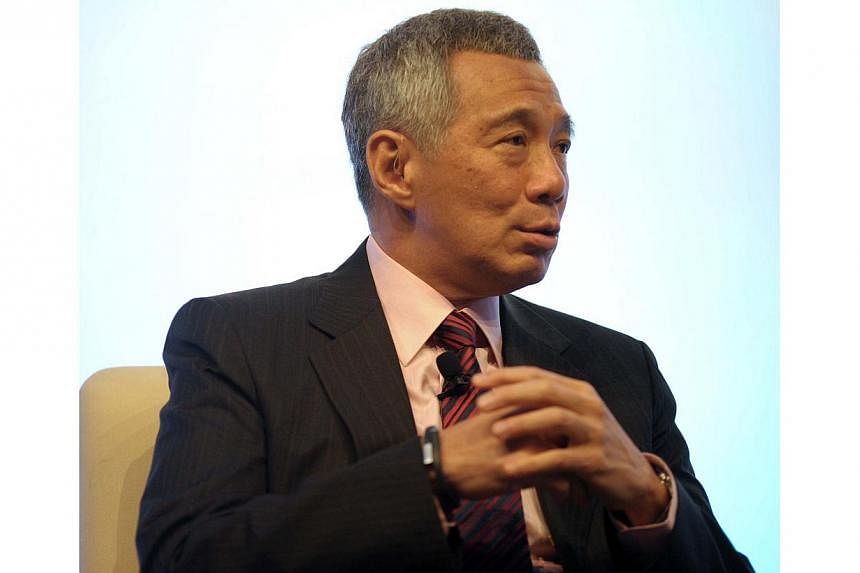 Singapore's next General Election (GE) may not take place "when everybody is expecting it", said Prime Minister Lee Hsien Loong on Friday. -- PHOTO: AFP&nbsp;