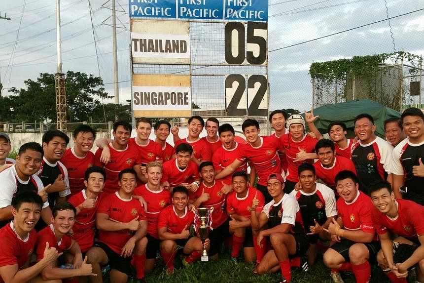 Singapore's Under-19 rugby team beat Thailand 22-5 to get promoted to division one of the Asian Rugby Football Union tournament, where they will compete alongside South Korea, Chinese Taipei and Sri Lanka. -- PHOTO:&nbsp;SINGAPORE RUGBY UNION