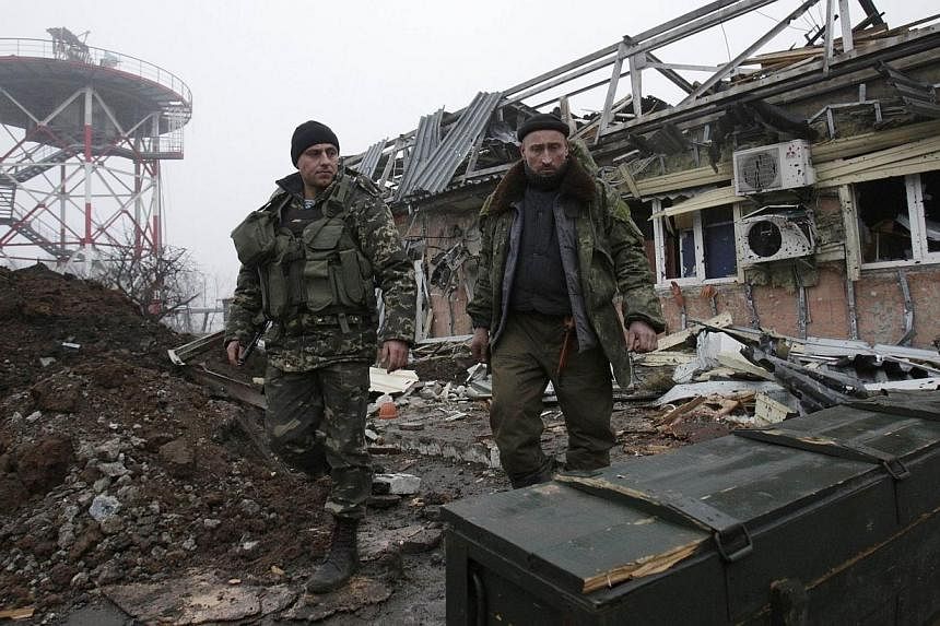 Fighting between government troops and pro-Russian rebels in Ukraine has left more than 300 people dead in less than a month, taking the overall toll to 4,634, the UN said on Saturday in its latest report on the conflict. -- PHOTO: AFP