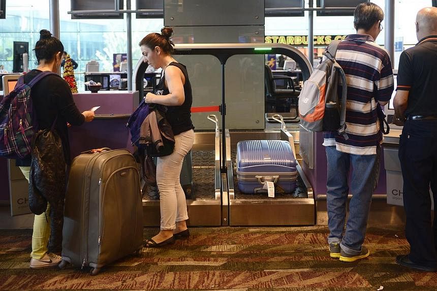 Between January and November, consumer watchdog Case acted on 92 complaints against carriers at Changi Airport. This is more than the 80 cases dealt with for the whole of last year and the 79 cases handled in 2012. -- ST PHOTO: MARK CHEONG
