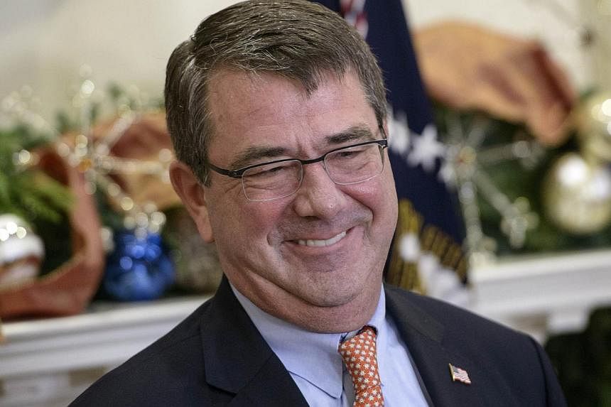 Mr Ashton Carter, President Barack Obama's nominee for &nbsp;US defence secretary, has undergone a long-planned surgical procedure on his back ahead of his confirmation in the Senate. -- PHOTO: AFP