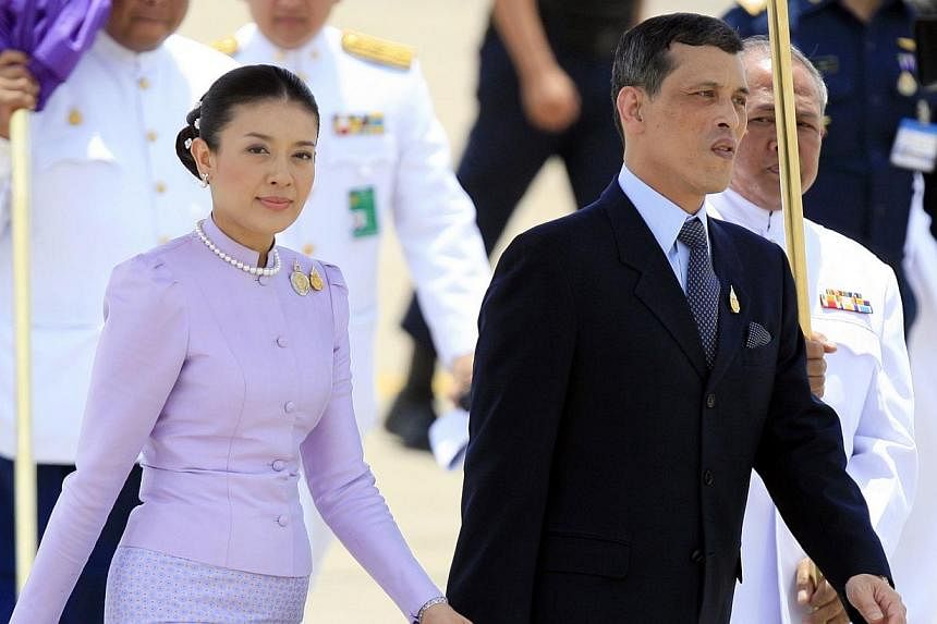 Thailand's Crown Prince Maha Vajiralongkorn walking with his wife Srirasmi after greeting foreign royalty in Bangkok in this June 11, 2006 file photo. Thailand's Princess Srirasmi, third wife of Crown Prince Vajiralongkorn, has resigned from her roya
