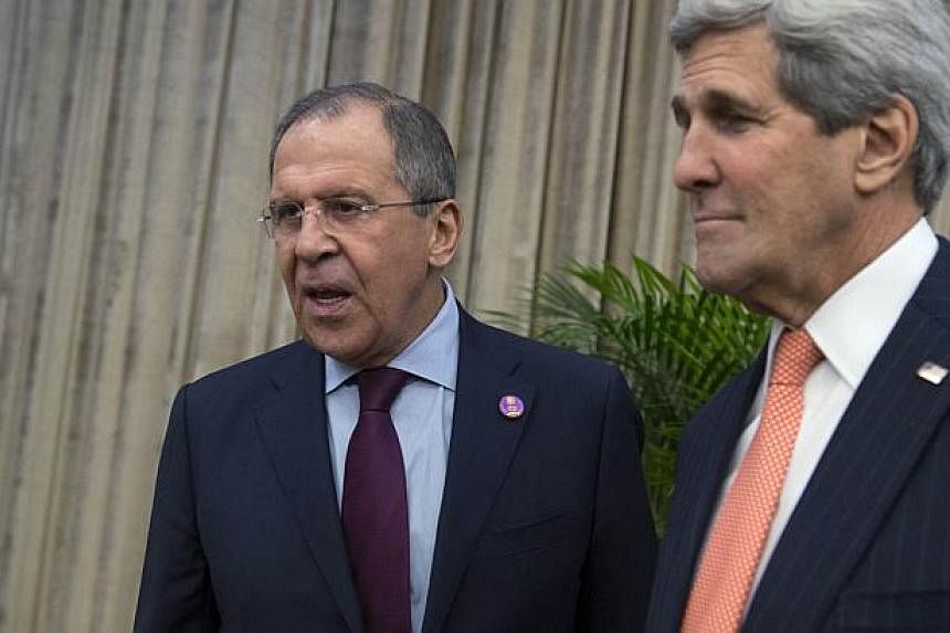 Russian Foreign Minister Sergei Lavrov (left) meeting US Secretary of State John Kerry at the Apec meeting in Beijing on Nov 8, 2014. Kerry and Lavrov will meet&nbsp;in Rome on Sunday, amid anger in Moscow over the prospect of new US sanctions and po