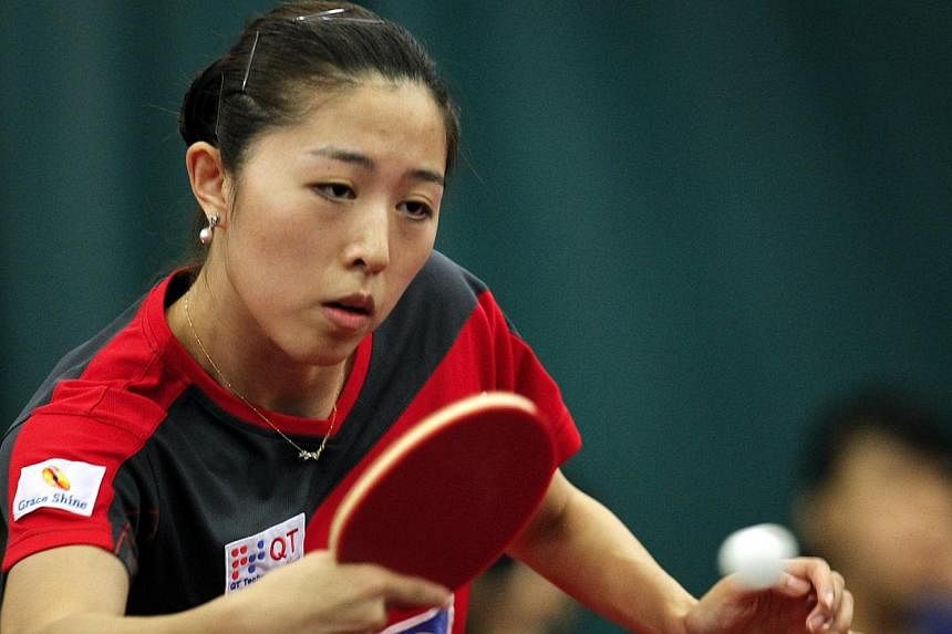 Singapore paddler Yu Mengyu's unexpected run in the International Table Tennis Federation (ITTF) World Tour Grand Finals came to an end today after she fell in the semi-finals. -- PHOTO: ST FILE