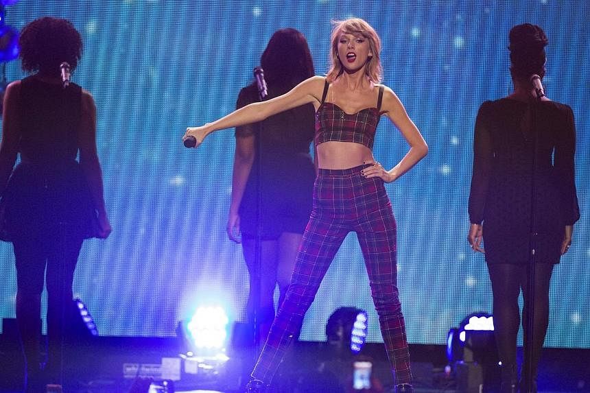 Singer Taylor Swift performs at Z100's Jingle Ball 2014 at Madison Square Garden in New York on Dec 12, 2014. -- PHOTO: REUTERS