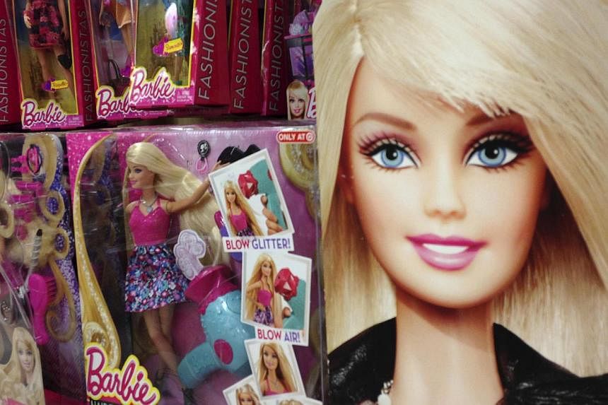Barbie dolls are shown in the toy department of a retail store in Encinitas, California Oct 14, 2014. &nbsp;A group of feminists, some dressed as princesses and maids, briefly occupied a Paris toy shop on Saturday to protest the gender stereotypes fu