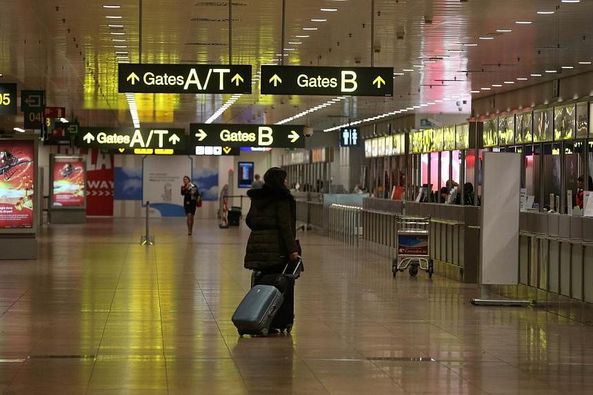 A photo taken on Dec 14, 2014 shows the near-empty Zaventem airport at the start of a 24-hour general strike in Belgium to protest against austerity measures taken by the federal government. Belgium braced itself on Dec 15 for the biggest national st