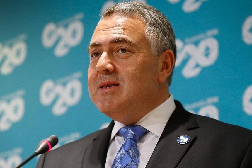 Releasing his midyear budget outlook on Monday, Treasurer Joe Hockey predicted the economy would grow by 2.5 per cent in 2014/15 before picking up to 3.5 percent over the next few years, while unemployment was likely to peak at 6.5 per cent. -- PHOTO