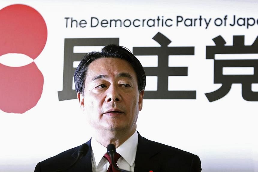 Japan's main opposition Democratic Party of Japan (DPJ) leader Banri Kaieda speaks during a news conference at the DPJ headquarters in Tokyo on Dec 15, 2014. -- PHOTO: REUTERS