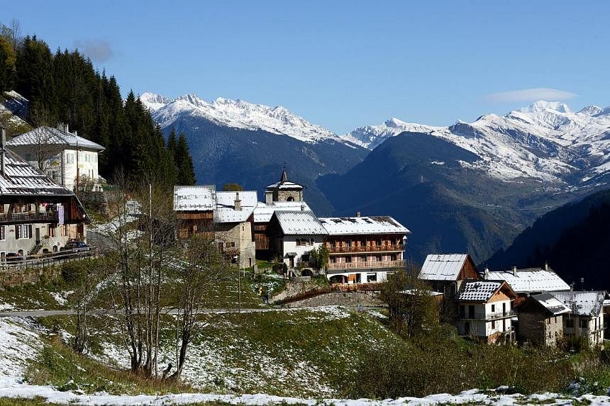 A general view shows the French Alps town of Celliers at an altitude of 1,450m on Oct 23, 2014, following the first snow fall of the season.&nbsp;With a little over a week until Christmas the lack of snow at top European ski resorts has caused a flur