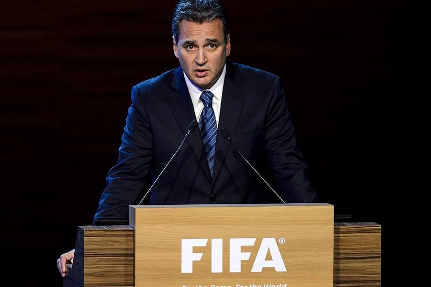 A file picture taken on June 11, 2014 shows FIFA ethics prosecutor Michael Garcia delivering a speech during the 64th FIFA congress in Sao Paulo, on the eve of the opening match of the 2014 FIFA World Cup in Brazil. -- PHOTO: AFP