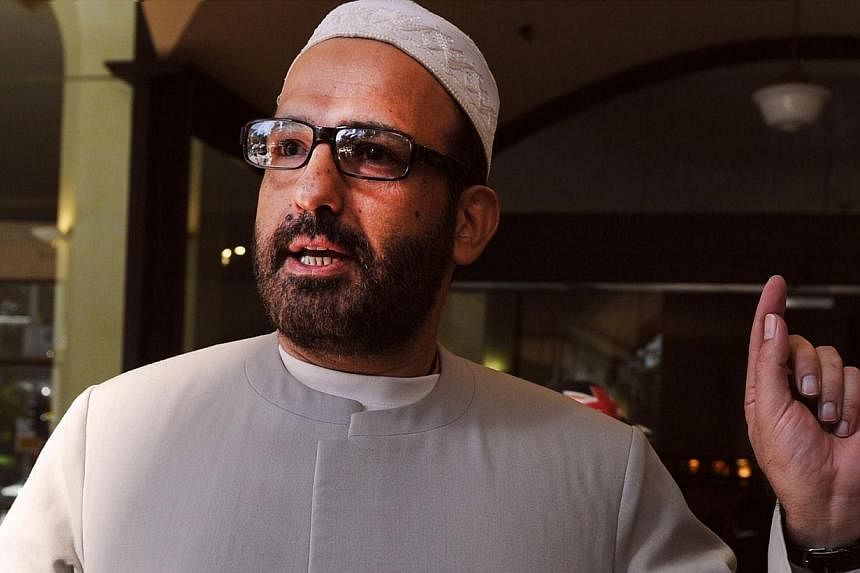 This file image shows Man Haron Monis, the gunman who took hostages inside Lindt Cafe in Sydney, Australia on Dec 15, 2014. -- PHOTO: AFP&nbsp;