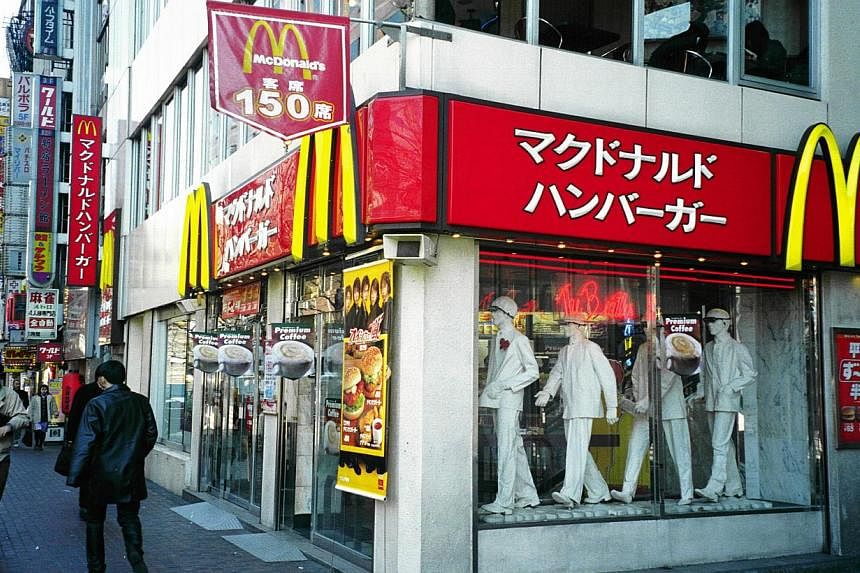 A McDonald's outlet in Japan. McDonald's Holdings in Japan is offering only small-sized french fries to customers as a protracted labour dispute at US West Coast ports has contributed to long delays in imports. -- PHOTO: THE NEW PAPER