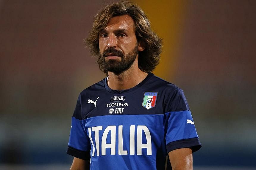 Juventus midfielder Andrea Pirlo claimed Serie A's player of the year award for the third consecutive year during a gala event on Monday organised by the Association of Italian Footballers. -- PHOTO: REUTERS