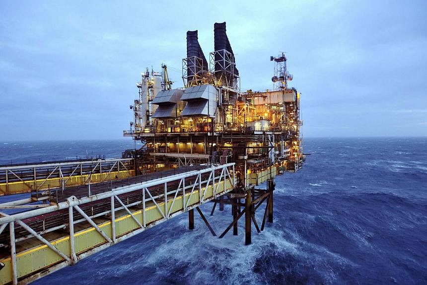 Part of the BP Eastern Trough Area Project oil platform in the North Sea. Oil sank to new lows in Asia on Dec 17 as dealers watch Russia's rouble crisis and await the latest US crude supply report. -- PHOTO: REUTERS