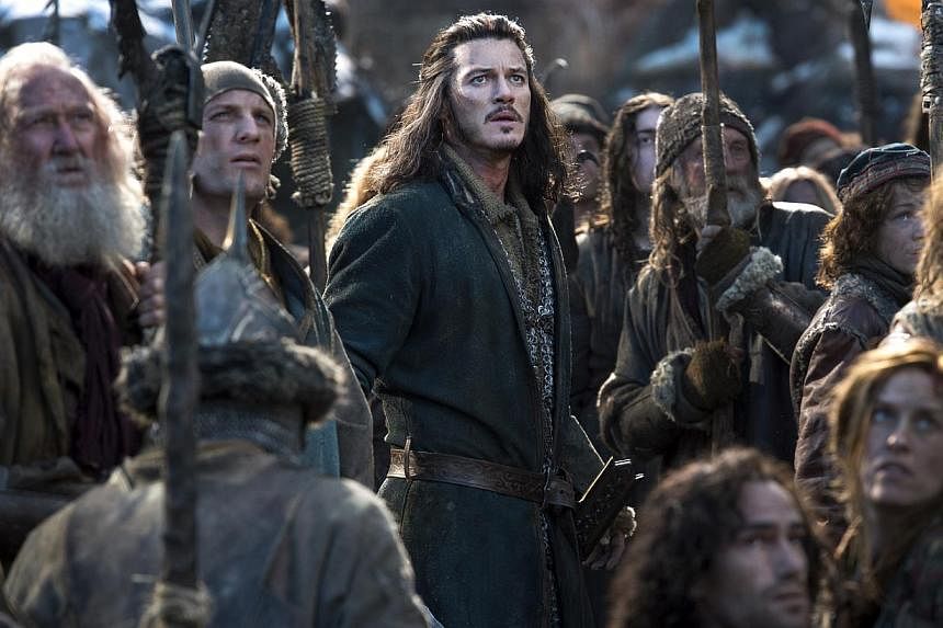 Actor Luke Evans (centre) plays Bard the Bowman who leads his people to defend themselves in battle.