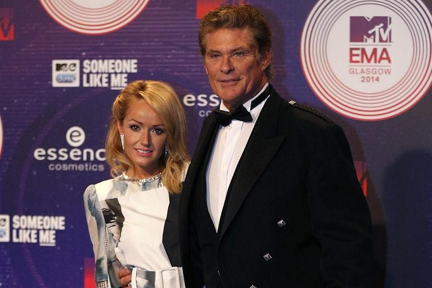 Actor David Hasselhoff and wife Hayley Roberts at the 2014 MTV Europe Music Awards in Scotland on Nov 9, 2014. Baywatch star Hasselhoff will join a massive open air New Year's Eve concert in Berlin at the iconic spot where he famously sang for freedo