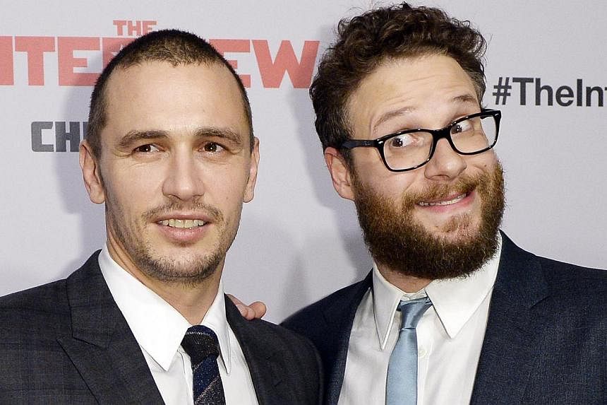 Cast members James Franco (left) and Seth Rogen (right) pose during premiere of the film The Interview in Los Angeles, California on Dec 11, 2014. -- PHOTO: REUTERS
