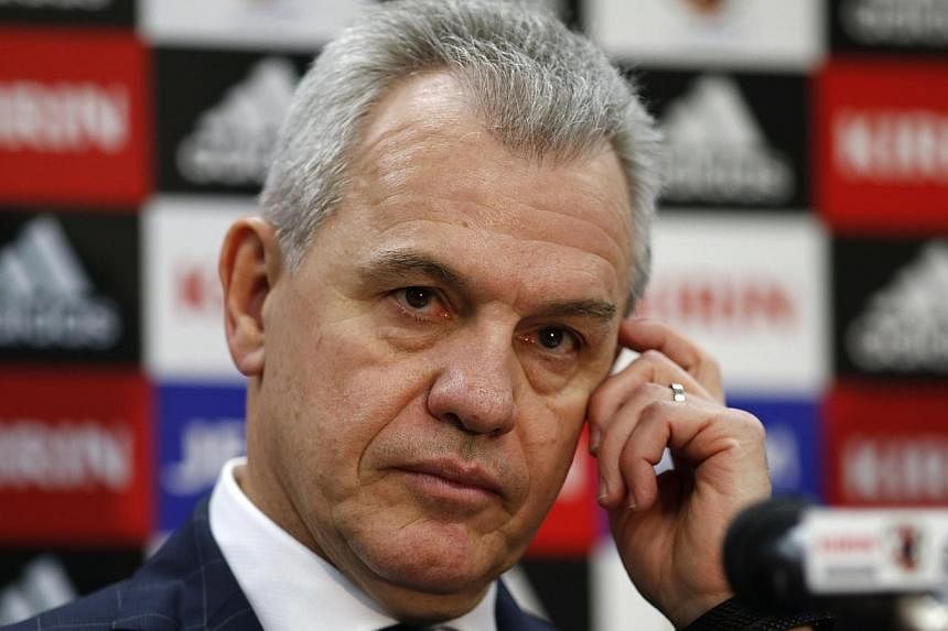 Japan's head coach Javier Aguirre gestures during a news conference in Tokyo on Dec 15, 2014.&nbsp;Japan will stick with coach Javier Aguirre for next month's Asian Cup, despite the former Mexico coach being involved in a match-fixing scandal which h