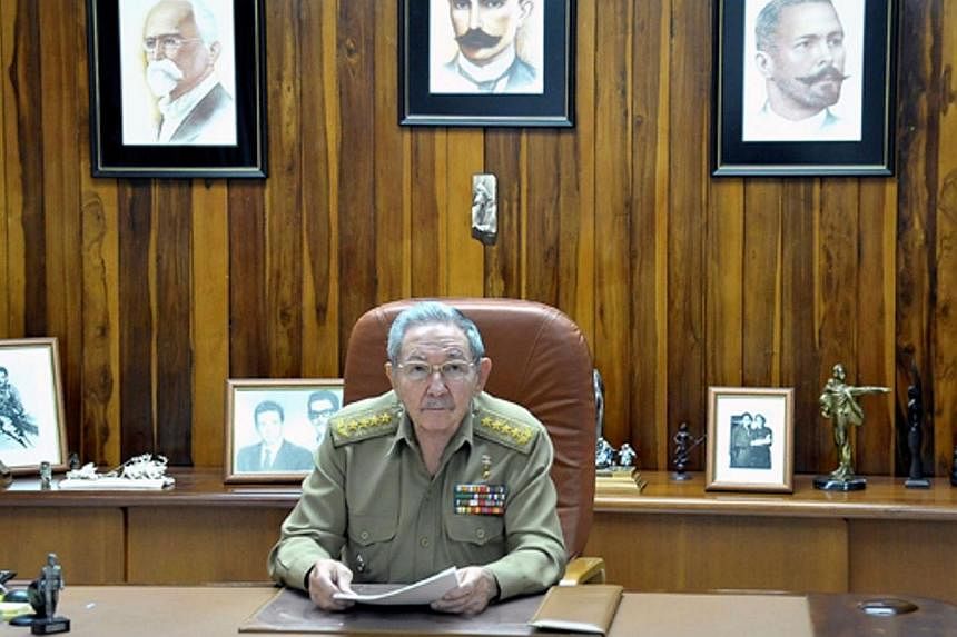 This picture released by Estudios Revolucion shows Cuban President Raul Castro addressing the nation on Dec 17, 2014, in Havana.&nbsp;The United States and Cuba moved to end five decades of Cold War hostility on Wednesday, Dec 17, 2014, agreeing to r
