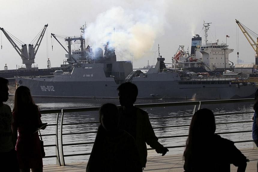 People viewing one of two of Vietnam's Russian-built missile-guided frigates docked at a bay in Manila on &nbsp;Nov 25, 2014. &nbsp;Vietnam's two most powerful warships were making their first port call to the Philippines but an official said it was 