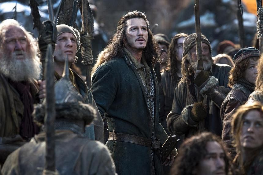 A cinema still from The Hobbit: The Battle Of The Five Armies starring Luke Evans (centre) as Bard the Bowman. -- PHOTO: WARNER BROS