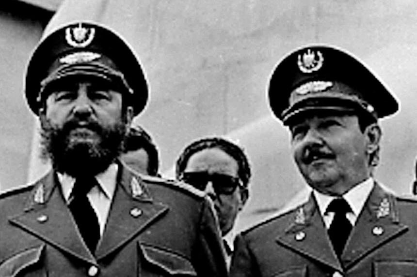 A Feb 1, 1979, file photo of then Cuban President Fidel Castro (left) and his brother, Mr Raul Castro, at the 20th anniversary of the Triumph of the Revolution at Revolution Square in Havana. -- PHOTO: REUTERS