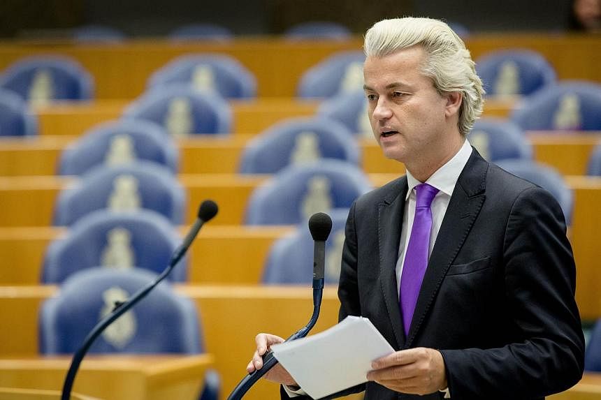 Dutch&nbsp;far-right populist lawmaker Geert Wilders speaks in the Parliament Building in The Hague, The Netherlands on Oct 9, 2014. Wilders is be tried for inciting racial hatred after pledging in March to ensure there were "fewer Moroccans" in the 