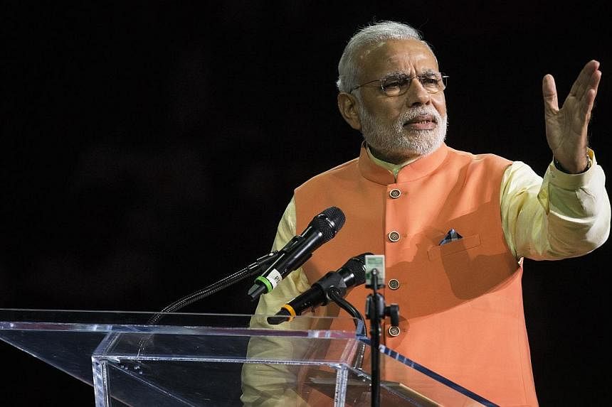 India's Prime Minister Narendra Modi speaks at Madison Square Garden in New York, during his visit to the United States on Sept 28, 2014. -- PHOTO: REUTERS