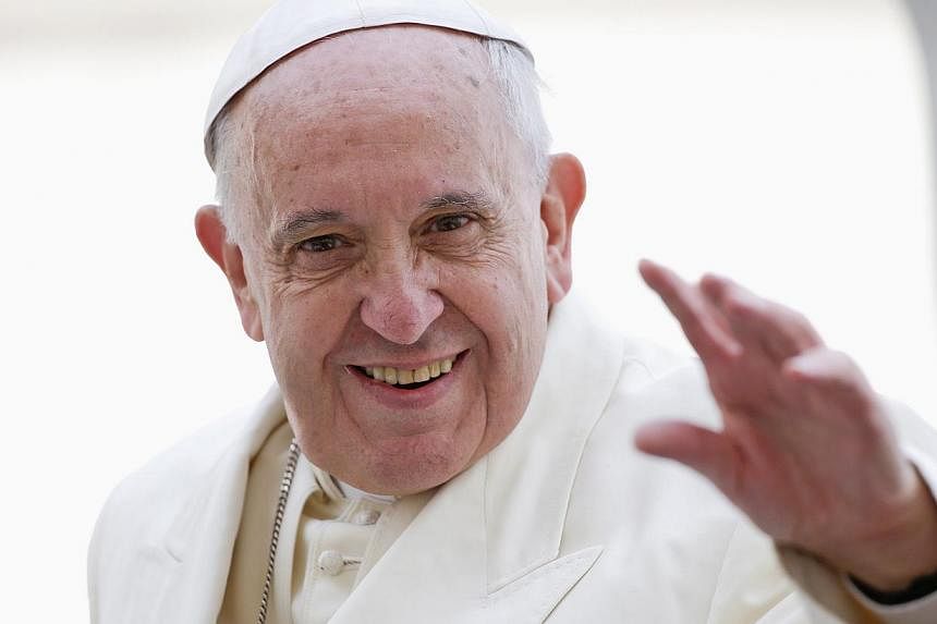 Pope Francis (above) played a vital role in bringing Cuba and the United States to the negotiating table, making a "personal appeal" to the nations' leaders, a US official said Wednesday. -- PHOTO: REUTERS
