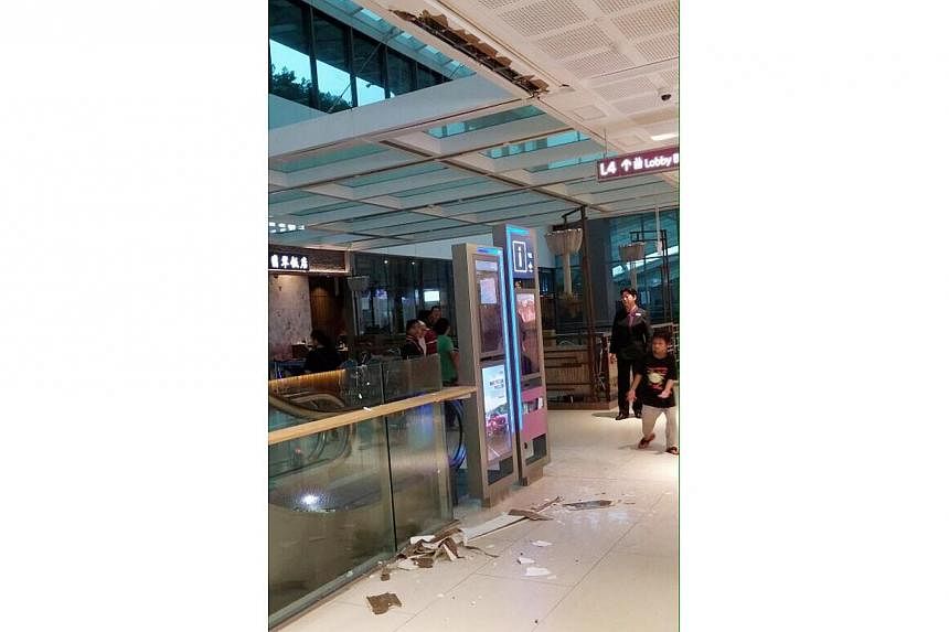 Heavy rain on Wednesday brought down a small section of the ceiling at Westgate. -- PHOTO:&nbsp;CAPITAMALLS ASIA