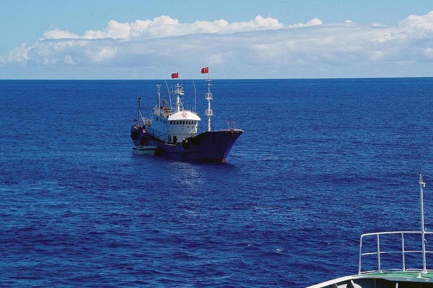 A Chinese fishing boat in Japan's exclusive economic zone near Ogasawara islands, 1,000km south of Tokyo. China will set up an offshore observation network, including satellite and radar stations, to strengthen the country's maritime power, the offic