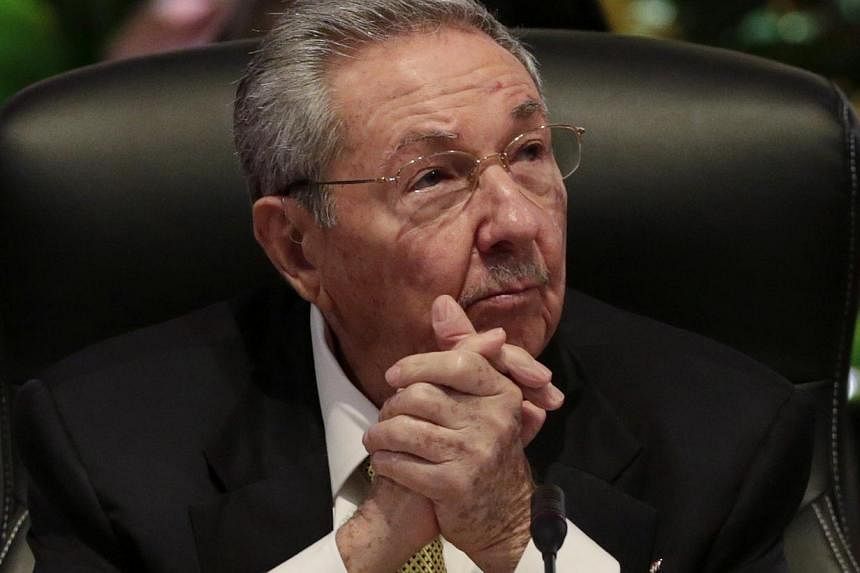 The White House raised the possibility on Thursday of a visit to Washington by Cuba's President Raul Castro (above). -- PHOTO: REUTERS