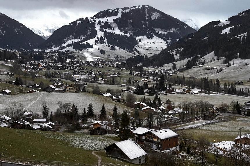 A picture taken on Dec 11, 2014 shows the Swiss resort of Gstaad, with little snow. In France,&nbsp;one ski resort that has been blessed with snowfall has been forced to impose quotas to prevent a run on its slopes. -- PHOTO: AFP