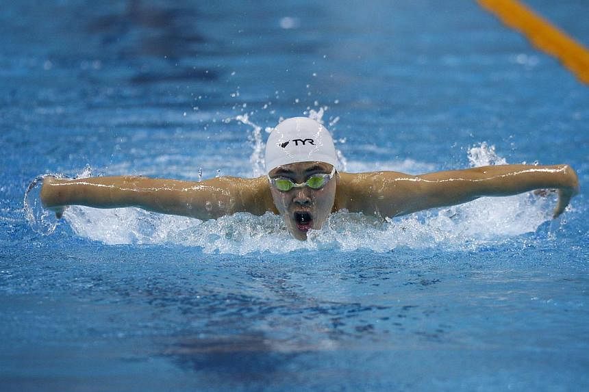 Despite coming in fourth, Maximillian Ang, 13, broke the national under-14 record in the 400 LC Meter Individual Medley during Day four of the Singapore National Swim Championships 2014, held at the OCBC Aquatic Centre on Dec 19, 2014. -- ST PHOTO:&n