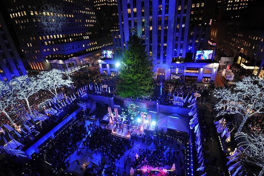 A view of the Rockefeller Center during the &nbsp;82nd annual Rockefeller Christmas Tree Lighting Ceremony. The United States issued a worldwide travel alert on Friday, warning Americans to be vigilant during the holiday period. -- PHOTO: AFP